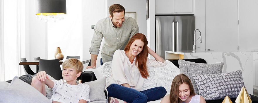 Family relaxing and enjoying a clean air home after going through a deep spring-cleaning checklist.