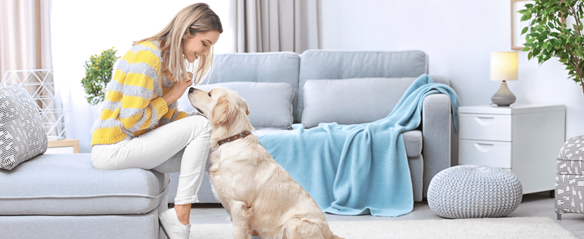 woman petting her dog